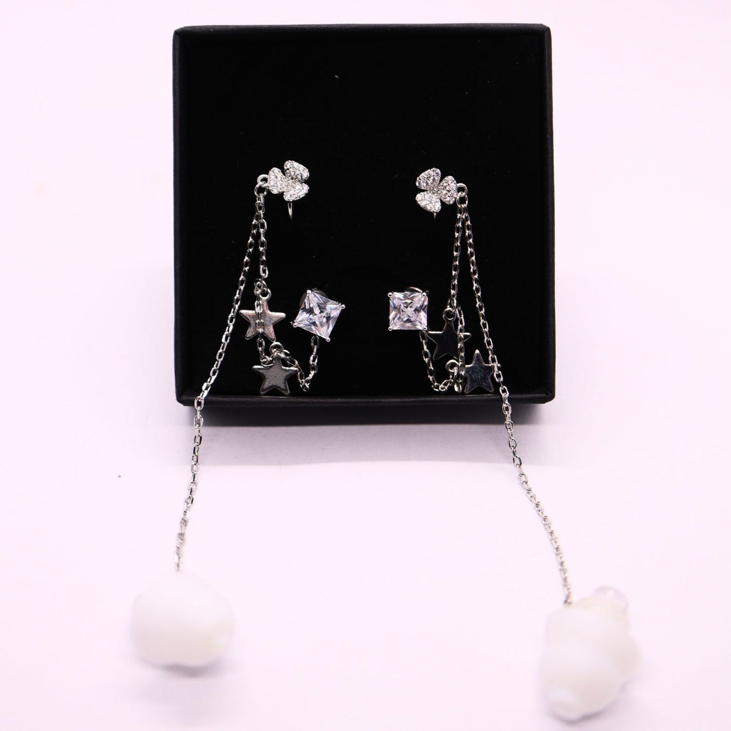 Earcuffs Oorbellen Voor Oordopjes (Ster) Zilverkleurig Sfeerbeeld